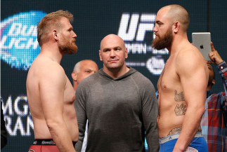 LAS VEGAS, NV - DECEMBER 27:  (L-R) Opponents Josh Barnett and Travis Browne face off during the UFC 168 weigh-in at the MGM Grand Garden Arena on December 27, 2013 in Las Vegas, Nevada. (Photo by Josh Hedges/Zuffa LLC/Zuffa LLC via Getty Images)