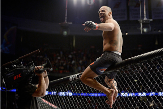 NEWARK, NJ - FEBRUARY 1: Renan Barao celebrates after defeating Uriah Faber by KO in their bantamweight championship fight during the UFC 169 event at the Prudential Center on February 1, 2014 in Newark, New Jersey. (Photo by Jeff Bottari/Zuffa LLC/Zuffa