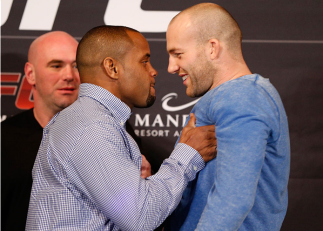 LAS VEGAS, NV - FEBRUARY 20: (L-R) Daniel Cormier shoves opponent Patrick Cummins during the final UFC 170 pre-fight press conference at the Mandalay Bay Resort and Casino on February 20, 2014 in Las Vegas, Nevada. (Photo by Josh Hedges/Zuffa LLC/Zuffa L