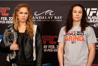 LAS VEGAS, NV - FEBRUARY 20:  (L-R) Opponents Ronda Rousey and Sara McMann pose for photos during the final UFC 170 pre-fight press conference at the Mandalay Bay Resort and Casino on February 20, 2014 in Las Vegas, Nevada. (Photo by Josh Hedges/Zuffa LLC