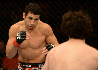 BALTIMORE, MD - APRIL 26:  (L-R) Danny Castillo squares off with Charlie Brenneman in their lightweight bout during the UFC 172 event at the Baltimore Arena on April 26, 2014 in Baltimore, Maryland. (Photo by Patrick Smith/Zuffa LLC/Zuffa LLC via Getty Im