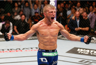 LAS VEGAS, NV - MAY 24: T.J. Dillashaw reacts to his victory over Renan Barao in their bantamweight championship bout during the UFC 173 event at the MGM Grand Garden Arena on May 24, 2014 in Las Vegas, Nevada. (Photo by Josh Hedges/Zuffa LLC/Zuffa LLC v