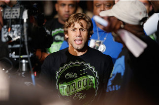 LAS VEGAS, NV - JULY 05: Urijah Faber enters the Octagon before his fight with Alex Caceres in their bantamweight fight at UFC 175 inside the Mandalay Bay Events Center on July 5, 2014 in Las Vegas, Nevada. (Photo by Josh Hedges/Zuffa LLC/Zuffa LLC via