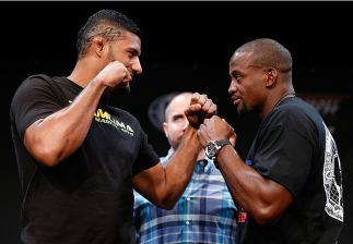 LAS VEGAS, NV - JULY 03:  (L-R) Opponents Dhiego Lima and Eddie Gordon face off during the UFC Ultimate Media Day at the Mandalay Bay Resort and Casino on July 3, 2014 in Las Vegas, Nevada.  (Photo by Josh Hedges/Zuffa LLC/Zuffa LLC via Getty Images)