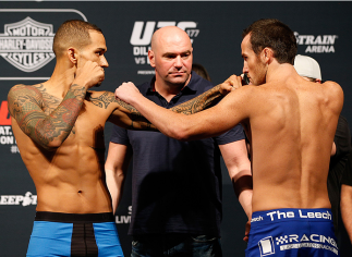 SACRAMENTO, CA - AUGUST 29: (L-R) Opponents Yancy Medeiros and Damon Jackson face off during the UFC 177 weigh-in at Sleep Train Arena on August 29, 2014 in Sacramento, California. (Photo by Josh Hedges/Zuffa LLC/Zuffa LLC via Getty Images)