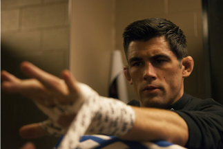LAS VEGAS, NV - SEPTEMBER 27: Dominick Cruz gets his hands wrapped before his fight against Takeya Mizugaki during the UFC 178 event inside the MGM Grand Garden Arena on September 27, 2014 in Las Vegas, Nevada. (Photo by Brandon Magnus/Zuffa LLC/Zuffa LL