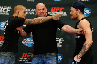 LAS VEGAS, NV - SEPTEMBER 25: (L-R) Opponents Dustin Poirier and Conor McGregor face off during the UFC 178 Ultimate Media Day at the MGM Grand Hotel/Casino on September 25, 2014 in Las Vegas, Nevada. (Photo by Josh Hedges/Zuffa LLC/Zuffa LLC via Getty I