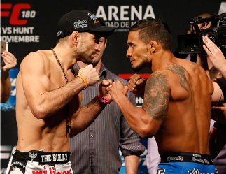 MEXICO CITY, MEXICO - NOVEMBER 14: (L-R) Opponents Ricardo Lamas of the United States and Dennis Bermudez of the United States face off during the UFC 180 weigh-in inside the Arena Ciudad de Mexcio on November 14, 2014 in Mexico City, Mexico. (Photo by Jo