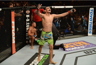 LAS VEGAS, NV - DECEMBER 06: Tony Ferguson reacts to his victory over Abel Trujillo in their lightweight bout during the UFC 181 event inside the Mandalay Bay Events Center on December 6, 2014 in Las Vegas, Nevada. (Photo by Robert Laberge/Zuffa LLC/Zuf