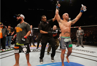 LAS VEGAS, NV - DECEMBER 06: Robbie Lawler (right) is declred the winner over Johny Hendricks (left) in their UFC welterweight championship bout during the UFC 181 event inside the Mandalay Bay Events Center on December 6, 2014 in Las Vegas, Nevada. (Ph