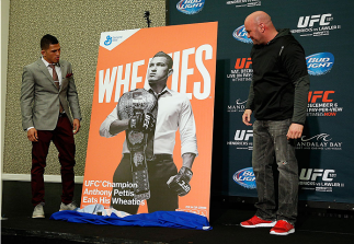 LAS VEGAS - DECEMBER 04: (R-L) UFC president Dana White and lightweight champion Anthony Pettis reveal the new Wheaties box artwork featuring Pettis during the UFC 181 Ultimate Media Day at the MGM Grand Hotel/Casino on December 4, 2014 in Las Vegas, Nev
