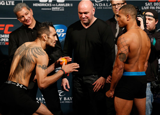 LAS VEGAS, NV - DECEMBER 05: (L-R) Opponents Tony Ferguson and Abel Trujillo face off during the UFC 181 weigh-in inside the Mandalay Bay Events Center on December 5, 2014 in Las Vegas, Nevada. (Photo by Josh Hedges/Zuffa LLC/Zuffa LLC via Getty Images)