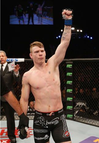 LAS VEGAS, NV - JANUARY 03: Paul Felder celebrates his win over Danny Castillo in their lightweight bout during the UFC 182 event at the MGM Grand Garden Arena on January 3, 2015 in Las Vegas, Nevada. (Photo by Josh Hedges/Zuffa LLC/Zuffa LLC via Getty