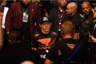 LAS VEGAS, NV - JANUARY 03: Kyoji Horiguchi enters the arena for his flyweight bout with Louis Gaudinot during the UFC 182 event on at the MGM Grand Garden Arena January 3, 2015 in Las Vegas, Nevada. (Photo by Josh Hedges/Zuffa LLC/Zuffa LLC via Getty I