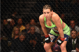 LAS VEGAS, NV - JANUARY 31: Miesha Tate prepares to face Sara McMann in their women's bantamweight bout during the UFC 183 event at the MGM Grand Garden Arena on January 31, 2015 in Las Vegas, Nevada. (Photo by Josh Hedges/Zuffa LLC/Zuffa LLC via Getty
