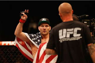 LAS VEGAS, NV - MAY 23: Chris Weidman reacts to his victory over Vitor Belfort of Brazil in their UFC middleweight championship bout during the UFC 187 event at the MGM Grand Garden Arena on May 23, 2015 in Las Vegas, Nevada. (Photo by Christian Peterse