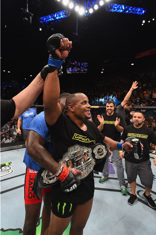 LAS VEGAS, NV - MAY 23: Daniel Cormier reacts to his victory over Anthony Johnson in their UFC light heavyweight championship bout during the UFC 187 event at the MGM Grand Garden Arena on May 23, 2015 in Las Vegas, Nevada. (Photo by Josh Hedges/Zuffa L