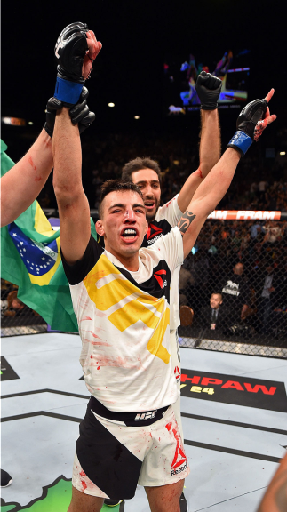 LAS VEGAS, NV - JULY 11: Thomas Almeida celebrates his win over Brad Pickett in their bantamweight fight during the UFC 189 event inside MGM Grand Garden Arena on July 11, 2015 in Las Vegas, Nevada. (Photo by Josh Hedges/Zuffa LLC/Zuffa LLC via Getty Im