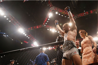 LAS VEGAS, NV - JULY 11: Conor McGregor reacts to his victory over Chad Mendes in their UFC interim featherweight title fight during the UFC 189 event inside MGM Grand Garden Arena on July 11, 2015 in Las Vegas, Nevada. (Photo by Christian Petersen/Zuf
