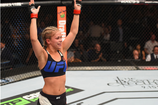LAS VEGAS, NV - SEPTEMBER 05: Paige VanZant reacts to her victory over Alex Chambers in their women's strawweight bout during the UFC 191 event inside MGM Grand Garden Arena on September 5, 2015 in Las Vegas, Nevada. (Photo by Josh Hedges/Zuffa LLC/Zuff