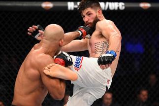 CURITIBA, BRAZIL - MAY 14: (R-L) Bryan Barberena kicks Warlley Alves of Brazil in their middleweight bout during the UFC 198 event at Arena da Baixada stadium on May 14, 2016 in Curitiba, Parana, Brazil. (Photo by Josh Hedges/Zuffa LLC/Zuffa LLC via Get
