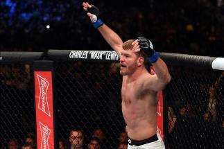 CURITIBA, BRAZIL - MAY 14: Stipe Miocic celebrates after defeating Fabricio Werdum of Brazil by KO in their UFC heavyweight championship bout during the UFC 198 event at Arena da Baixada stadium on May 14, 2016 in Curitiba, Parana, Brazil. (Photo by Jos