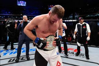 CURITIBA, BRAZIL - MAY 14:  Stipe Miocic celebrates after defeating Fabricio Werdum of Brazil by KO in their UFC heavyweight championship bout during the UFC 198 event at Arena da Baixada stadium on May 14, 2016 in Curitiba, Parana, Brazil.  (Photo by Jos