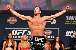 INGLEWOOD, CA - JUNE 03: UFC middleweight champion Luke Rockhold steps on the scale during the UFC 199 weigh-in at the Forum on June 3, 2016 in Inglewood, California. (Photo by Josh Hedges/Zuffa LLC/Zuffa LLC via Getty Images)