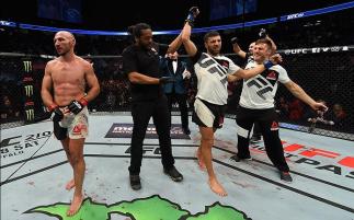 LAS VEGAS, NV - MARCH 04: David Teymur of Sweden (center) reacts to his victory over Lando Vannata (left) in their lightweight bout during the UFC 209 event at T-Mobile Arena on March 4, 2017 in Las Vegas, Nevada. (Photo by Josh Hedges/Zuffa LLC/Zuffa LL