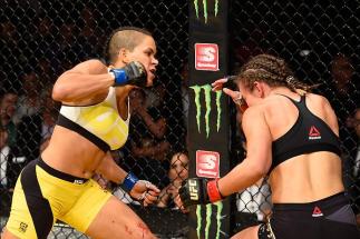 LAS VEGAS, NV - JULY 09: (L-R) Amanda Nunes of Brazil punches Miesha Tate in their UFC women's bantamweight championship bout during the UFC 200 event on July 9, 2016 at T-Mobile Arena in Las Vegas, Nevada. (Photo by Josh Hedges/Zuffa LLC/Zuffa LLC via G