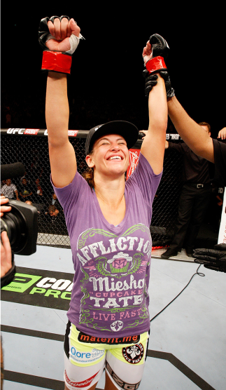 SAITAMA, JAPAN - SEPTEMBER 20: Miesha Tate celebrates after her win over Rin Nakai in their bantamweight bout during the UFC Fight Night event inside the Saitama Arena on September 20, 2014 in Saitama, Japan. (Photo by Mitch Viquez/Zuffa LLC/Zuffa LLC vi