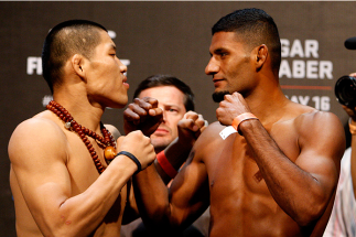 PASAY, METRO MANILA, PHILIPPINES - MAY 15: (L and R) Li Jingliang and Dhiego Lima face-off during the UFC weigh-in event at the Mall of Asia Arena on May 15, 2015 in Pasay, Metro Manila, Philippines. (Photo by Mitch Viquez/Zuffa LLC/Zuffa LLC via Getty Im