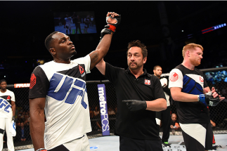 NASHVILLE, TN - AUGUST 08: (L-R) Derek Brunson celebrates after defeating Sam Alvey in their middleweight bout during the UFC Fight Night event at Bridgestone Arena on August 8, 2015 in Nashville, Tennessee. (Photo by Josh Hedges/Zuffa LLC/Zuffa LLC via