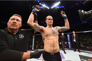 ORLANDO, FL - DECEMBER 19: Tamdan McCrory celebrates his submission victory over Josh Samman in their middleweight bout during the UFC Fight Night event at the Amway Center on December 19, 2015 in Orlando, Florida. (Photo by Josh Hedges/Zuffa LLC/Zuffa