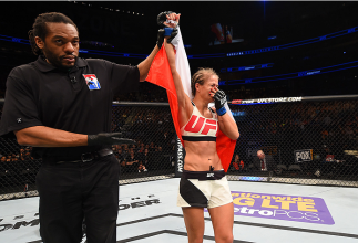 ORLANDO, FL - DECEMBER 19: Karolina Kowalkiewicz celebrates her victory over Randa Markos in their women's strawweight bout during the UFC Fight Night event at the Amway Center on December 19, 2015 in Orlando, Florida. (Photo by Josh Hedges/Zuffa LLC/Zu