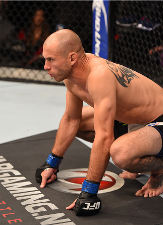 ORLANDO, FL - DECEMBER 19: Donald Cerrone enters the Octagon before facing Rafael dos Anjos in their UFC lightweight title bout during the UFC Fight Night event at the Amway Center on December 19, 2015 in Orlando, Florida. (Photo by Josh Hedges/Zuffa LL