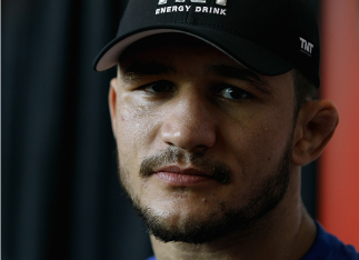 PHOENIX, AZ - DECEMBER 10: Number 2-ranked UFC heavyweight contender Junior Dos Santos looks on during UFC Fight Night open workouts at U.S. Airways Center on December 10, 2014 in Phoenix, Arizona. (Photo by Ralph Freso/Zuffa LLC/Zuffa LLC via Getty Ima