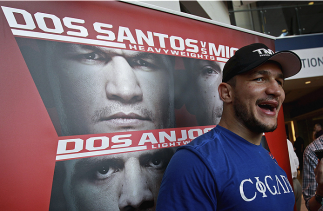 PHOENIX, AZ - DECEMBER 10: Number 2-ranked UFC heavyweight contender Junior Dos Santos laughs as he talks with the media during UFC Fight Night open workouts at U.S. Airways Center on December 10, 2014 in Phoenix, Arizona. (Photo by Ralph Freso/Zuffa LL