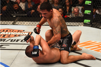 PHOENIX, AZ - DECEMBER 13: Rafael dos Anjos (top) of Brazil controls the body of Nate Diaz in their lightweight fight during the UFC Fight Night event at the U.S. Airways Center on December 13, 2014 in Phoenix, Arizona. (Photo by Josh Hedges/Zuffa LLC/Z