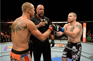 ATLANTIC CITY, NJ - JULY 16: (L-R) Donald "Cowboy" Cerrone and Jim Miller touch gloves before their lightweight bout during the UFC Fight Night event at Revel Casino on July 16, 2014 in Atlantic City, New Jersey. (Photo by Jeff Bottari/Zuffa LLC/Zuffa LLC