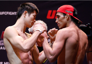AUCKLAND, NEW ZEALAND - JUNE 27: (L-R) Opponents Hatsu Hioki of Japan and Charles Oliveira of Brazil during the UFC weigh-in at Vector Arena on June 27, 2014 in Auckland, New Zealand. (Photo by Josh Hedges/Zuffa LLC/Zuffa LLC via Getty Images)