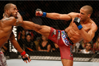 AUSTIN, TX - NOVEMBER 22: (R-L) Edson Barboza of Brazil kicks Bobby Green in their lightweight bout during the UFC Fight Night event at The Frank Erwin Center on November 22, 2014 in Austin, Texas. (Photo by Josh Hedges/Zuffa LLC/Zuffa LLC via Getty Ima