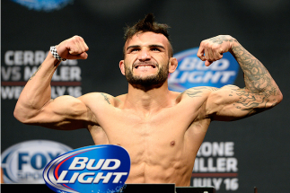 ATLANTIC CITY, NJ - JULY 15: John Lineker steps on the scale during the UFC Fight Night weigh-in at Revel Casino on July 15, 2014 in Atlantic City, New Jersey. (Photo by Jeff Bottari/Zuffa LLC/Zuffa LLC via Getty Images)
