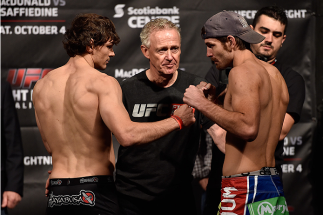 HALIFAX, NS - OCTOBER 3:  (L-R) Olivier Aubin-Mercier of Canada and Jake Lindsey of the United States face off during the UFC Fight Night weigh-in at the Scotiabank Centre on October 3, 2014 in Halifax, Nova Scotia, Canada. (Photo by Jeff Bottari/Zuffa LL