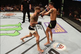 LAS VEGAS, NV - MAY 29:  (L-R) Cody Garbrandt punches Thomas Almeida of Brazil in their bantamweight bout during the UFC Fight Night event inside the Mandalay Bay Events Center on May 29, 2016 in Las Vegas, Nevada.  (Photo by Josh Hedges/Zuffa LLC/Zuffa L