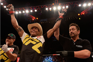 SAO PAULO, BRAZIL - NOVEMBER 07: Alex Oliveira of Brazil celebrates victory over Piotr Hallmann of Poland in their lightweight bout during the UFC Fight Night Belfort v Henderson at Ibirapuera Gymnasium on November 7, 2015 in Sao Paulo, Brazil. (Photo b