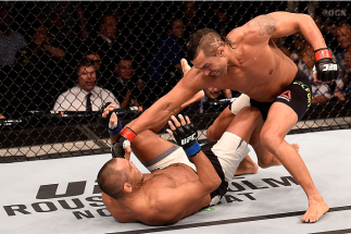 SAO PAULO, BRAZIL - NOVEMBER 07: Vitor Belfort of Brazil punches Dan Henderson of the United States in their middleweight bout during the UFC Fight Night Belfort v Henderson on November 7, 2015 in Sao Paulo, Brazil. (Photo by Buda Mendes/Zuffa LLC/Zuffa