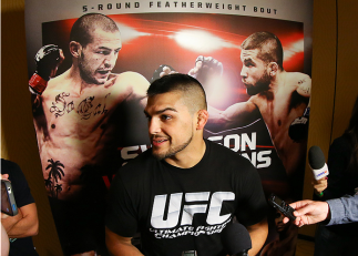 SAN ANTONIO, TX - JUNE 26: Kelvin Gastelum speaks to the media after his open training session at the Grand Hyatt San Antonio on June 26, 2014 in San Antonio, Texas. (Photo by Ed Mulholland/Zuffa LLC/Zuffa LLC via Getty Images)