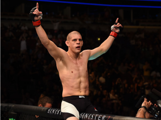 CHICAGO, IL - JULY 25: Joe Lauzon reacts after his knockout victory over Takanori Gomi of Japan in their lightweight bout during the UFC event at the United Center on July 25, 2015 in Chicago, Illinois. (Photo by Jeff Bottari/Zuffa LLC/Zuffa LLC via Get