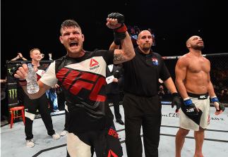 GLASGOW, SCOTLAND - JULY 18: Michael Bisping of England reacts after his split-decision victory over Thales Leites of Brazil in their middleweight fight during the UFC Fight Night event inside the SSE Hydro on July 18, 2015 in Glasgow, Scotland. (Photo